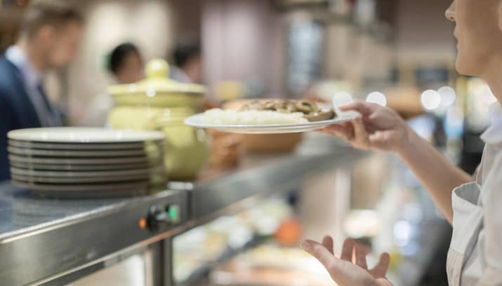 Serving food in a cafeteria